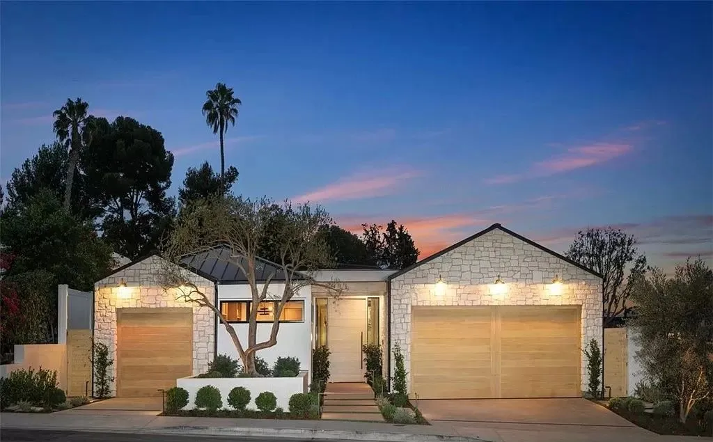 Corona del Mar custom home at dusk with new roof