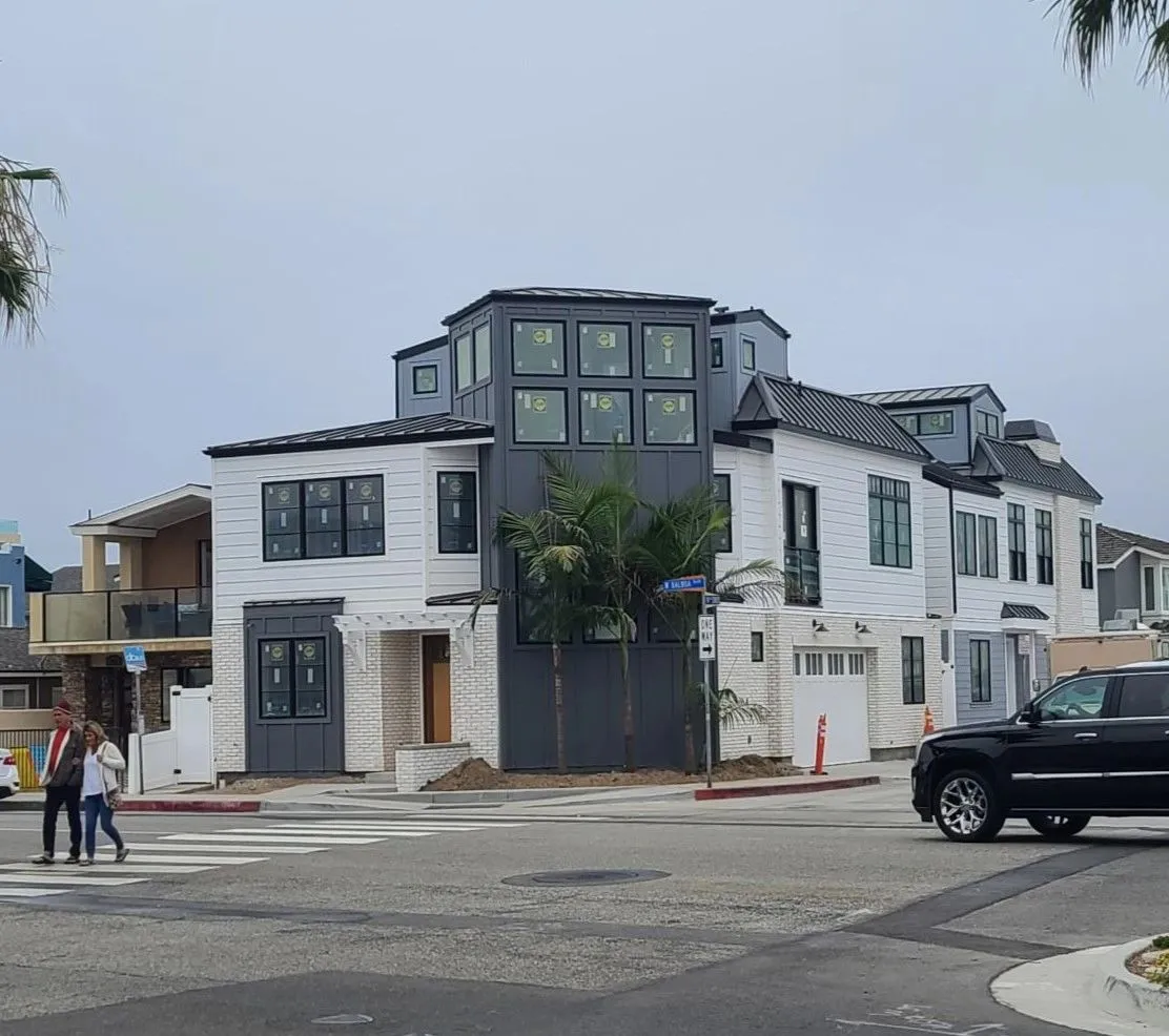 Three-story Newport Beach residence new construction with a standing seam metal roof