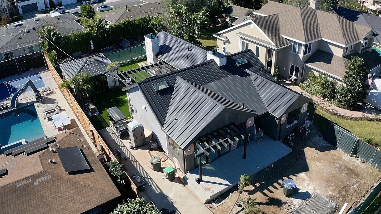 Aerial view of a Costa Mesa home with new standing seam metal roof